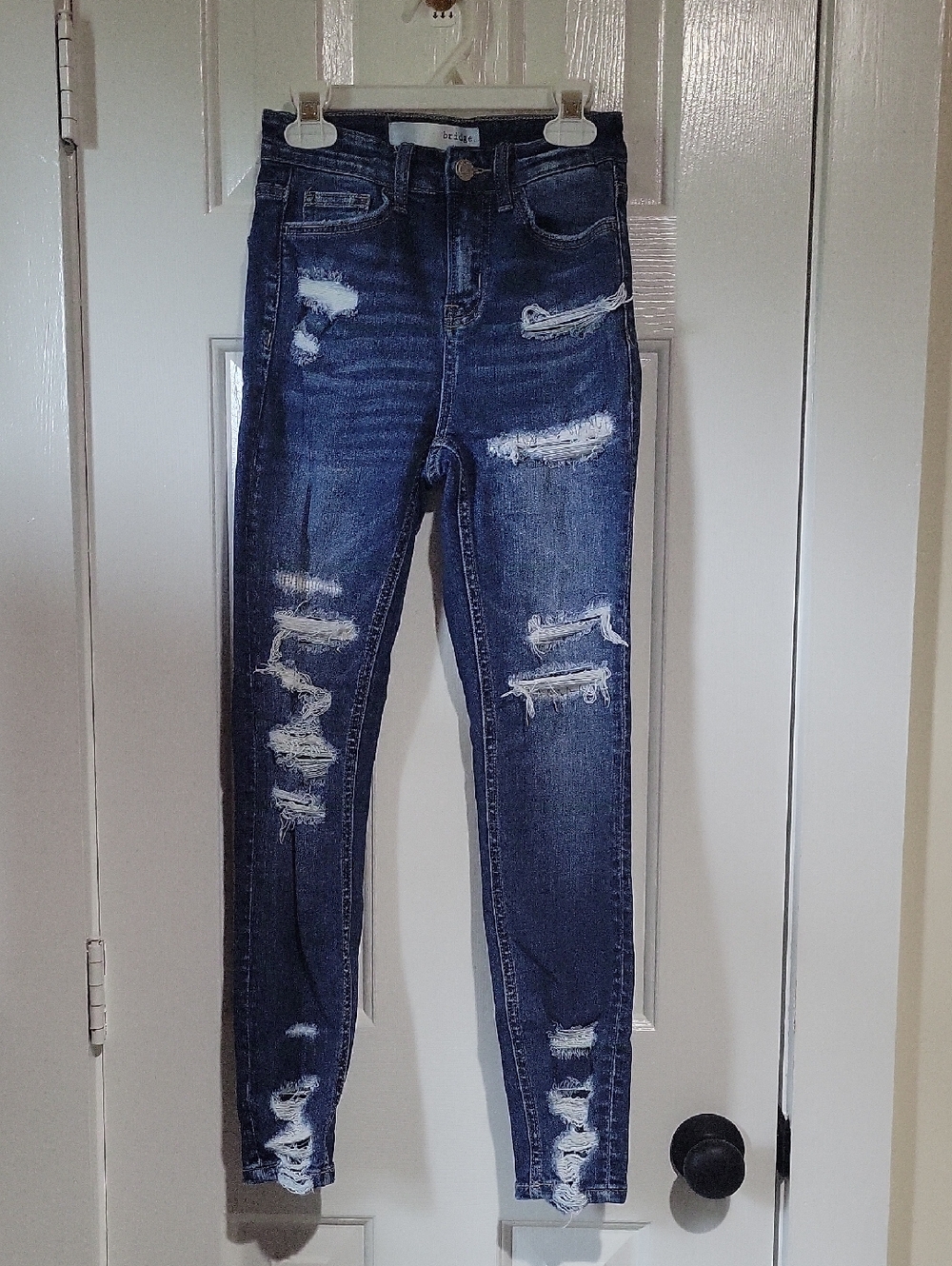 High-Rise Ripped Skinny Jeans in Dark Blue Size 00 / 23